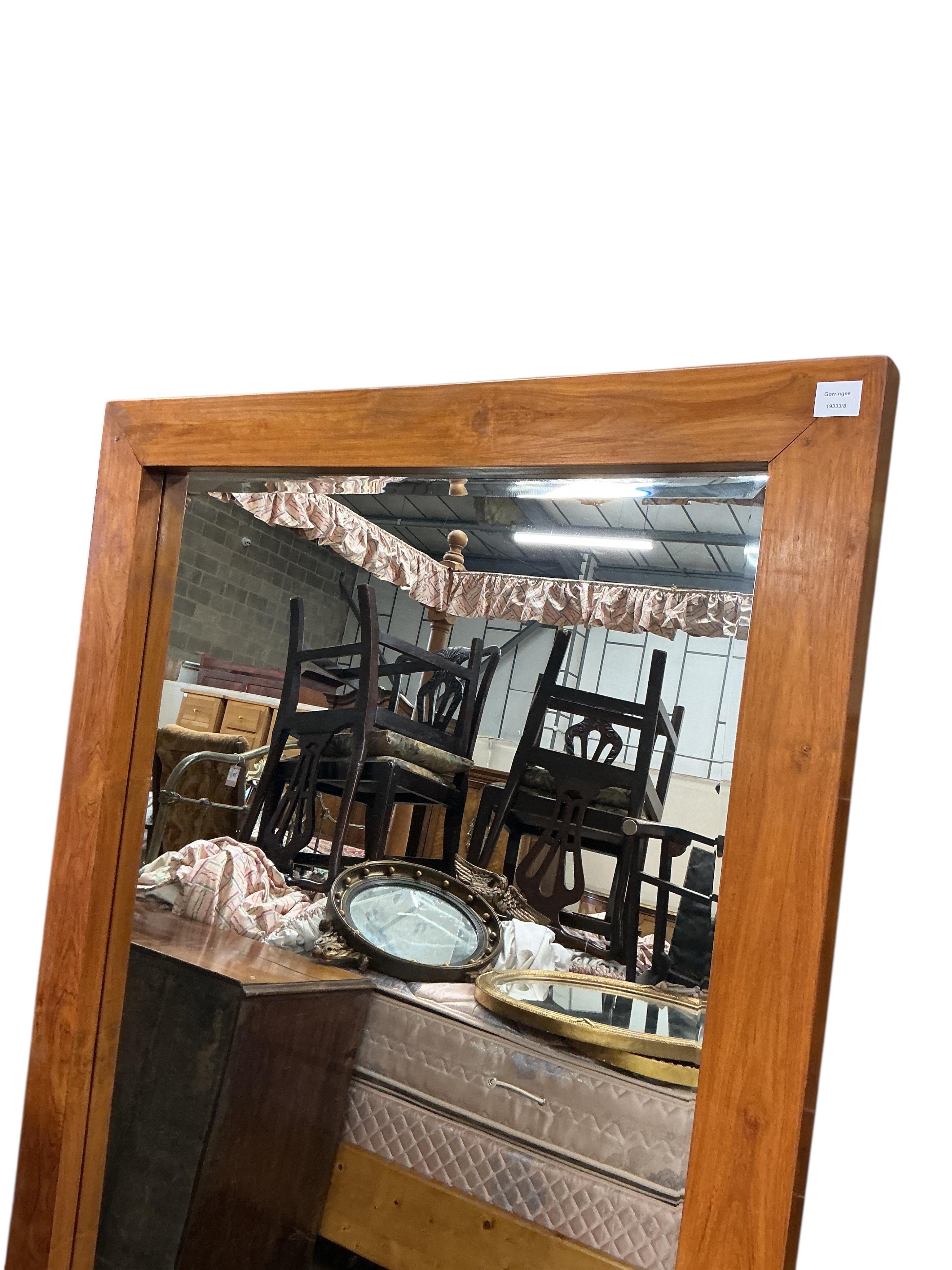 A large rectangular Contemporary oak framed wall mirror, width 110cm, height 126cm